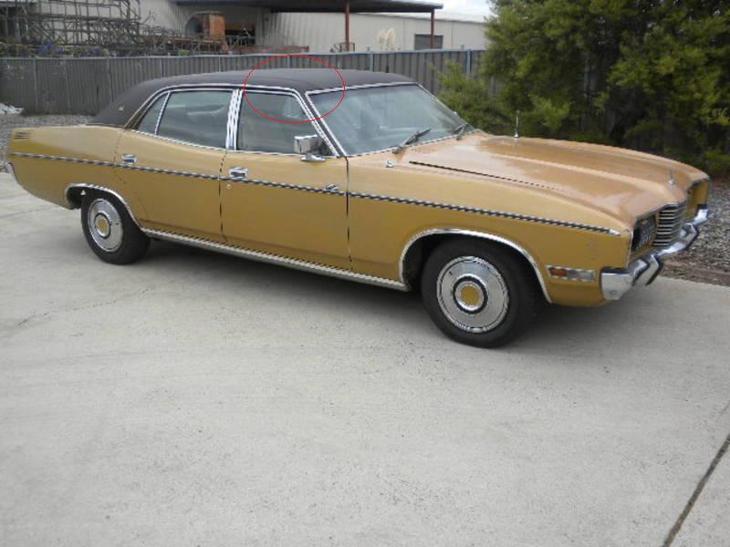 The LTD with Vinyl Roof. Although the image is faint you can just make out the line that runs along the under grove/bump.